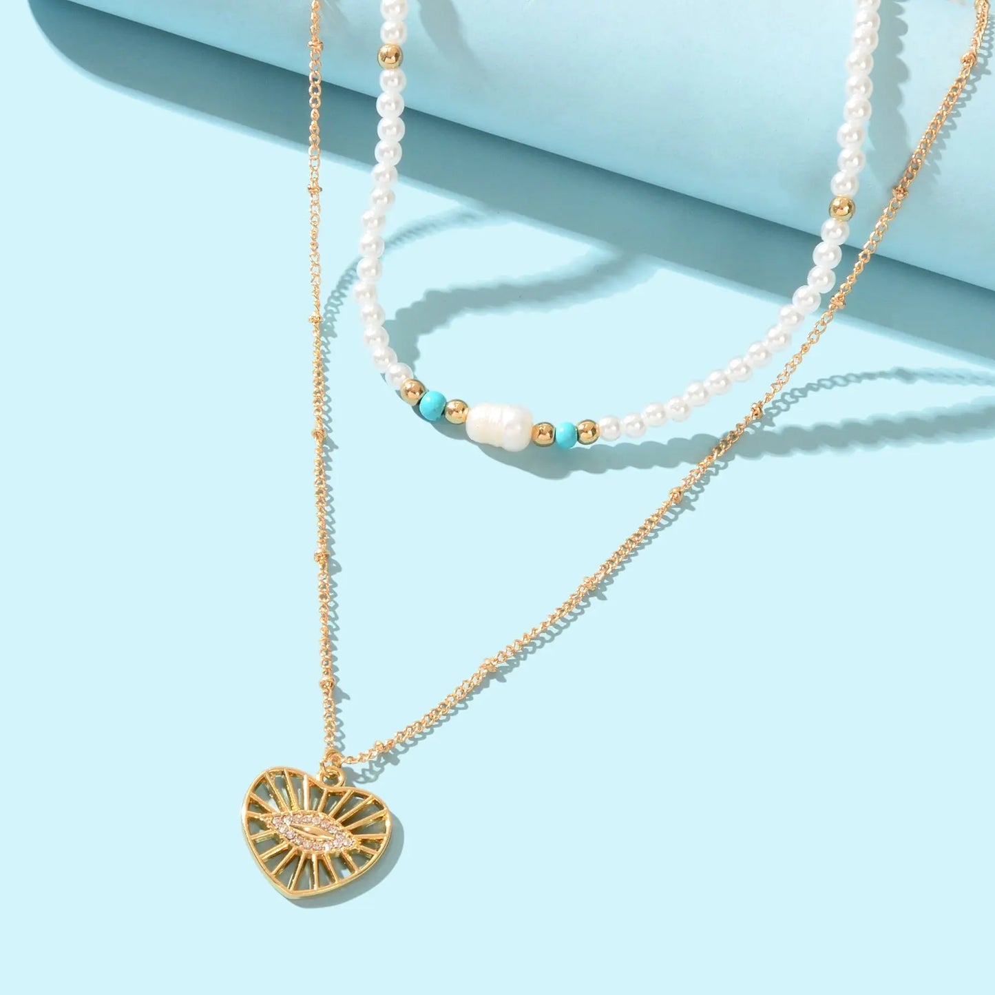 Boho Chic Layered Gold Pearl Beaded Chain Eye Hollow Gold Heart Pendant Necklace Feelontop Jewellery